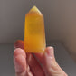 Obelisco calcite arancione